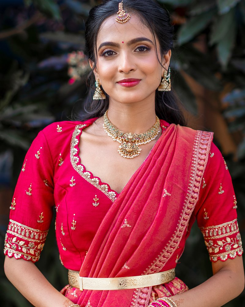 Bridal glam makeup with statement gold jewelry
